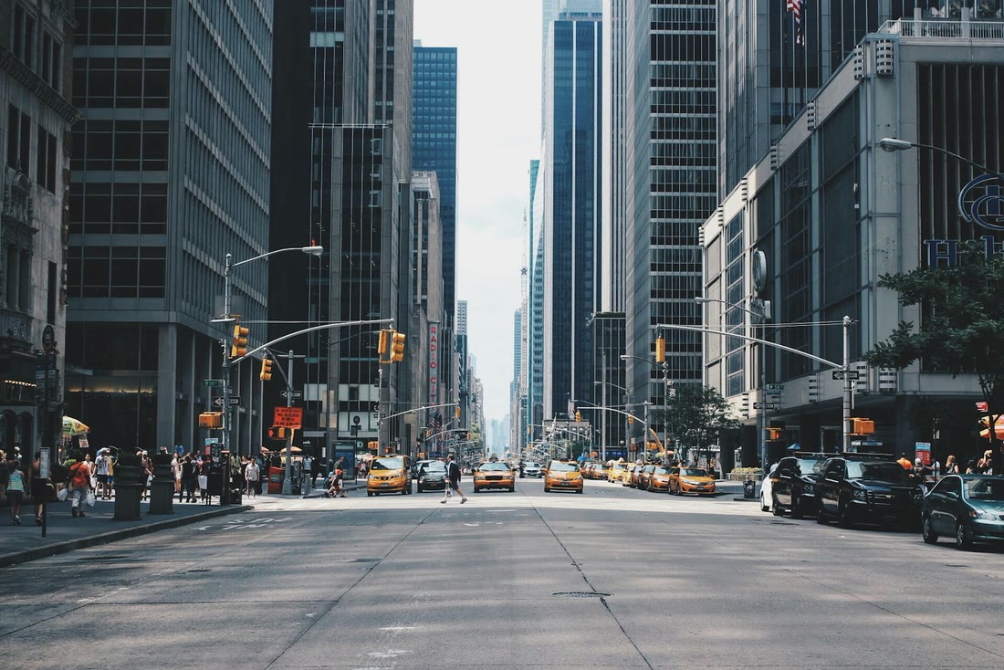 Neutral daylight city street with grey buildings